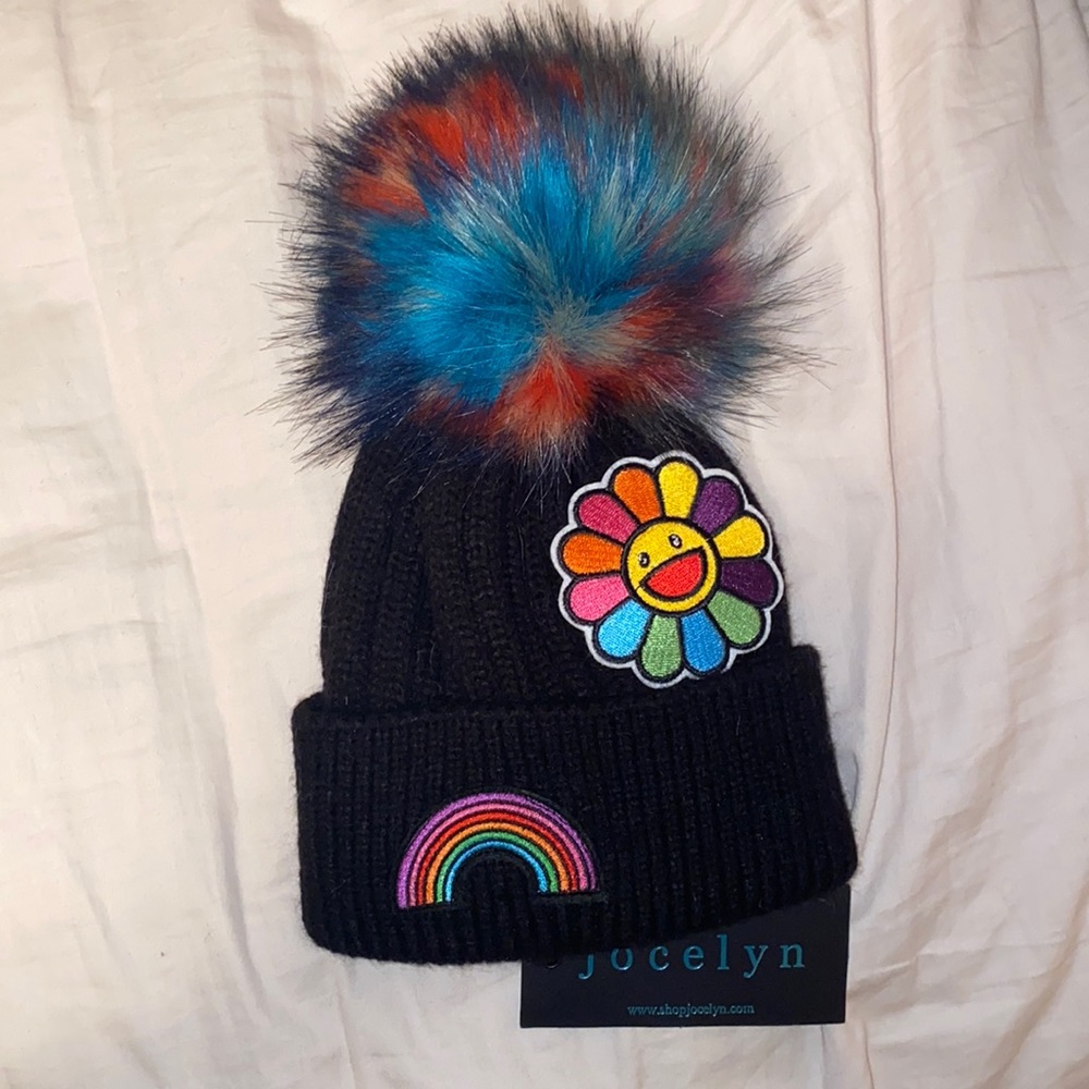 NWT Jocelyn Kids Black Knitted Beanie Hat wit Patches and Faux Fur Pom